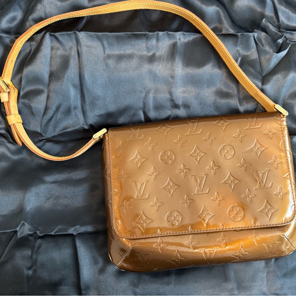 Louis Vuitton -Thompson Leather Handbag- Bronze
Brand New- Never Worn